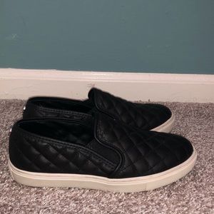 Steve Madden black quilted slip ons